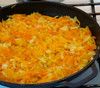 Обжариваем на сковородке мелко нарезанный лук ( можно и полукольцами кому нравится) и морковку, выкладываем обжарку на рыбу.Сверху обжарки выкладываем консервированные грибы и поливаем все это майонезом. трем на терке сыр мелко и посыпаем сверху майонеза.